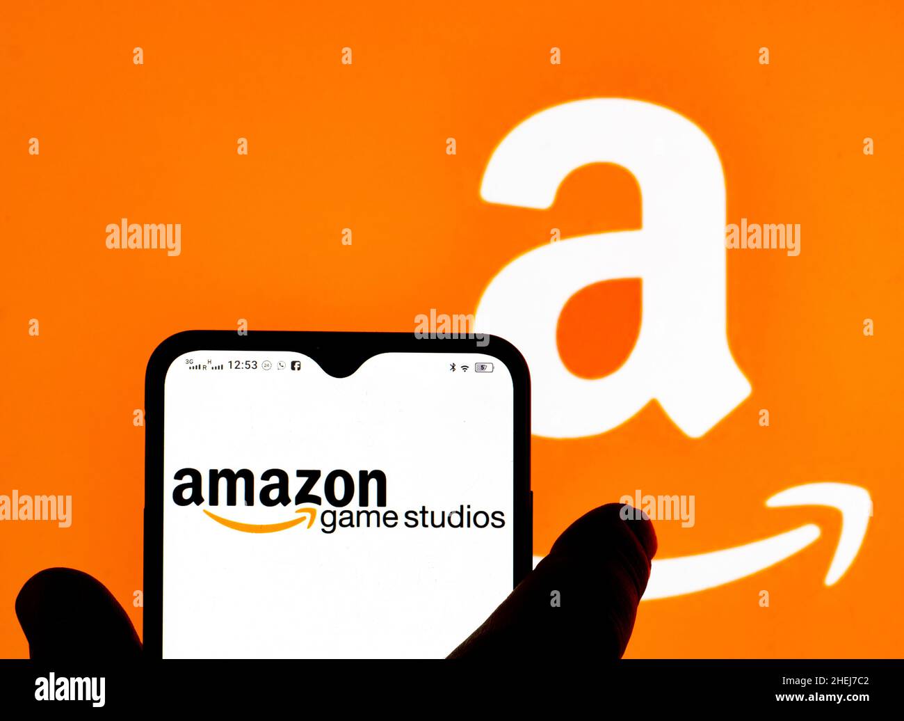 In this photo illustration Amazon Game Studios logo seen displayed on a