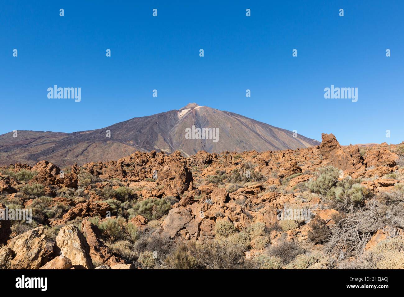 Teide mountain and lava fields on Tenerife with blue sky Stock Photo