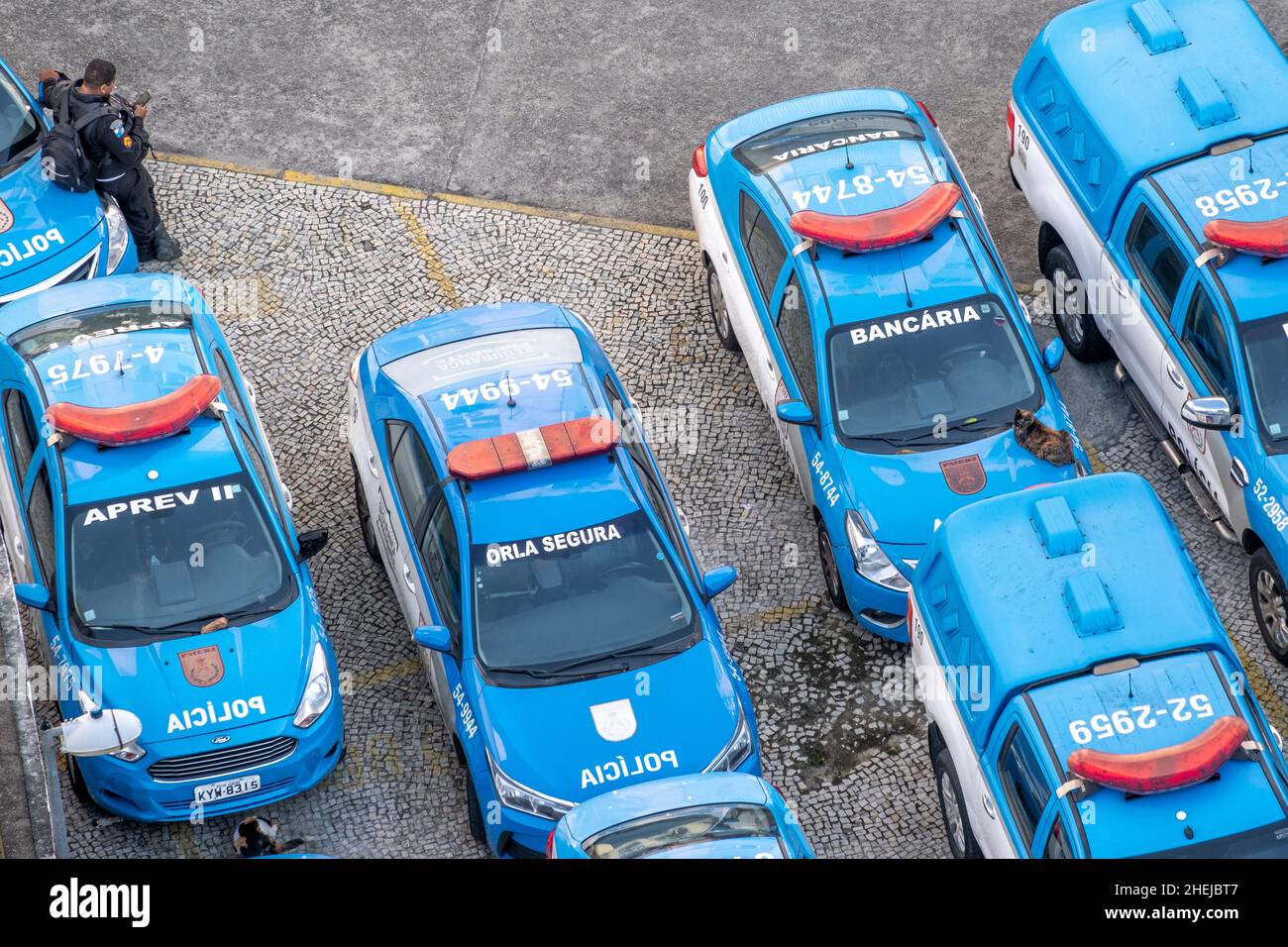 Police cars in a police station. PM (Policia Militar) Militia Police, vehicles photographed from above, law enforcement, Rio de Janeiro, Brazil Stock Photo