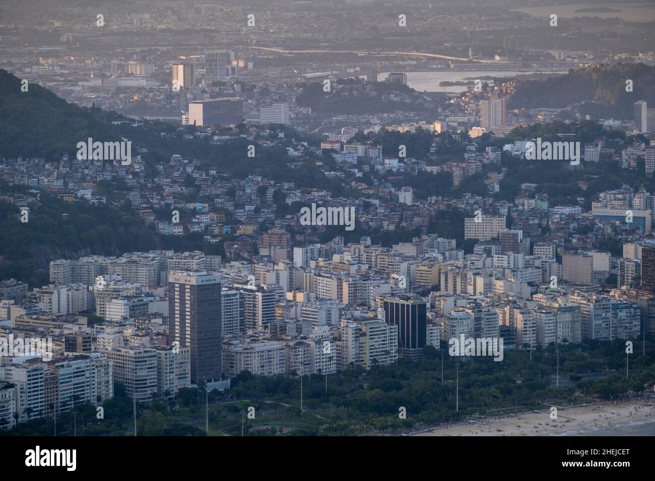 Rio, Flamengo beach - the WLM (foreground tallest building) & apartments. Tavares Bastos & Santo Amaro favelas behind, the centre & Guanabara Bay Stock Photo