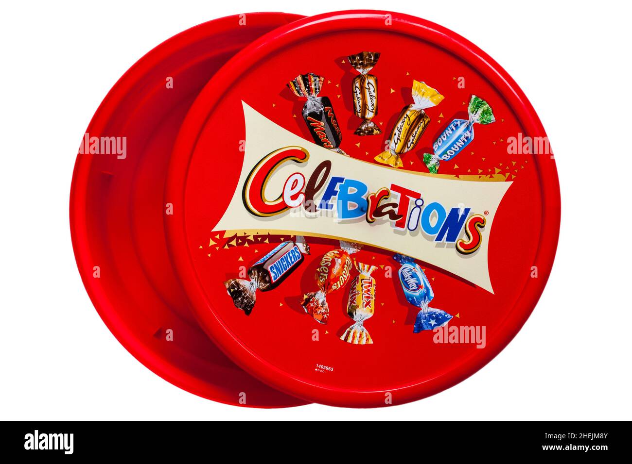 Empty tub of Celebrations chocolates sweets isolated on white background - lid removed all gone Stock Photo