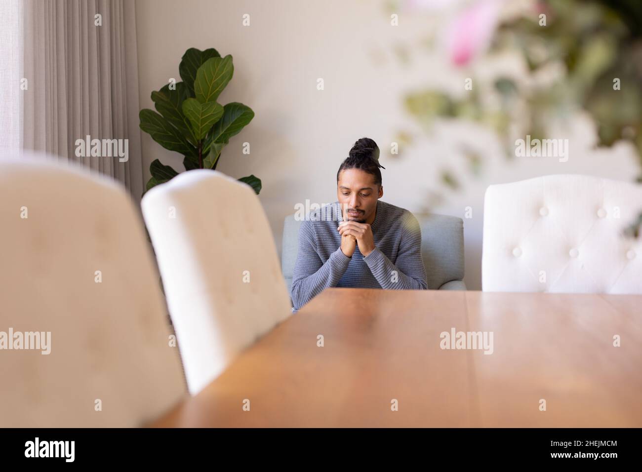 Man sitting chair hi-res stock photography and images - Alamy