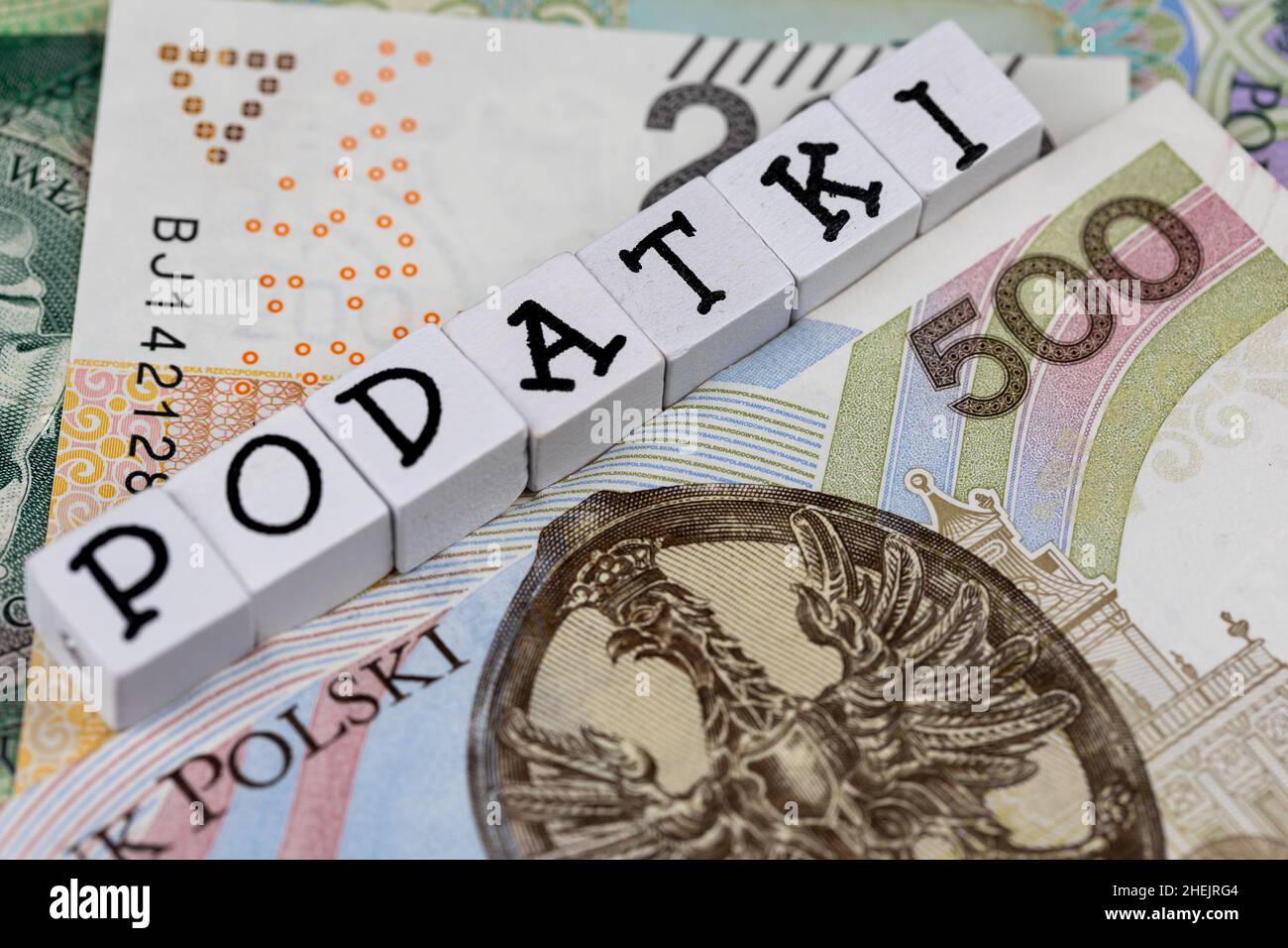 The wording "Podatki" translated as "Taxes" plus many Polish banknotes