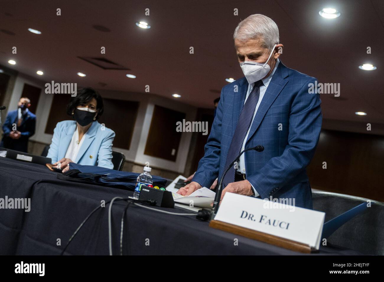 Washington, United States. 11th Jan, 2022. Dr. Anthony Fauci, Director of the NIAID, and Rochelle Walensky, Director of the CDC, prepare to testify before a Senate Health, Education, Labor, and Pensions Committee hearing to examine the federal response to COVID-19 and new emerging variants on Capitol Hill in Washington, DC on Tuesday, January 11, 2022. Pool photo by Shawn Thew/UPI Credit: UPI/Alamy Live News Stock Photo