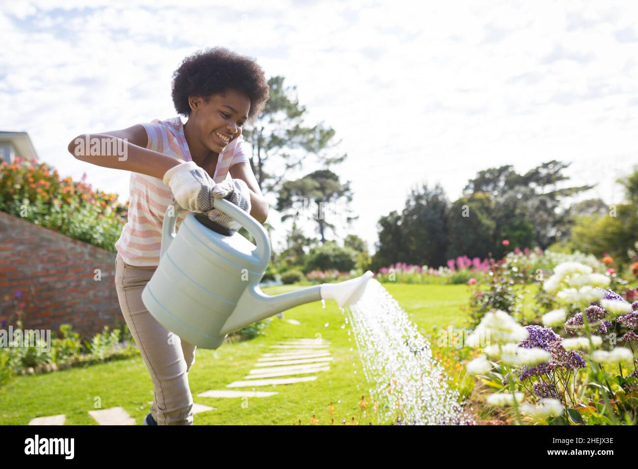 Watering plants with watering can hires stock photography and images Alamy