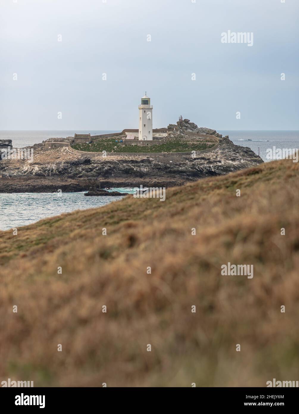 Cornwall, UK - A view of the 'Godrevy Lighthouse' on the southwestern tip of the United Kingdom on Godrevy Island, St Ives Bay on a cold afternoon in Stock Photo
