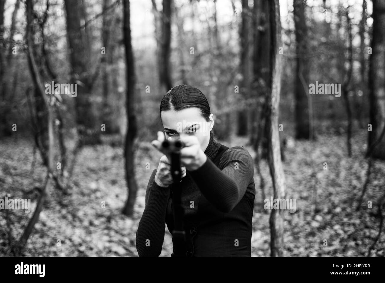 Hunting target. Target shot. female hunter in forest. woman with weapon. girl with rifle. chase hunting. Gun shop. successful hunt. hunting sport Stock Photo