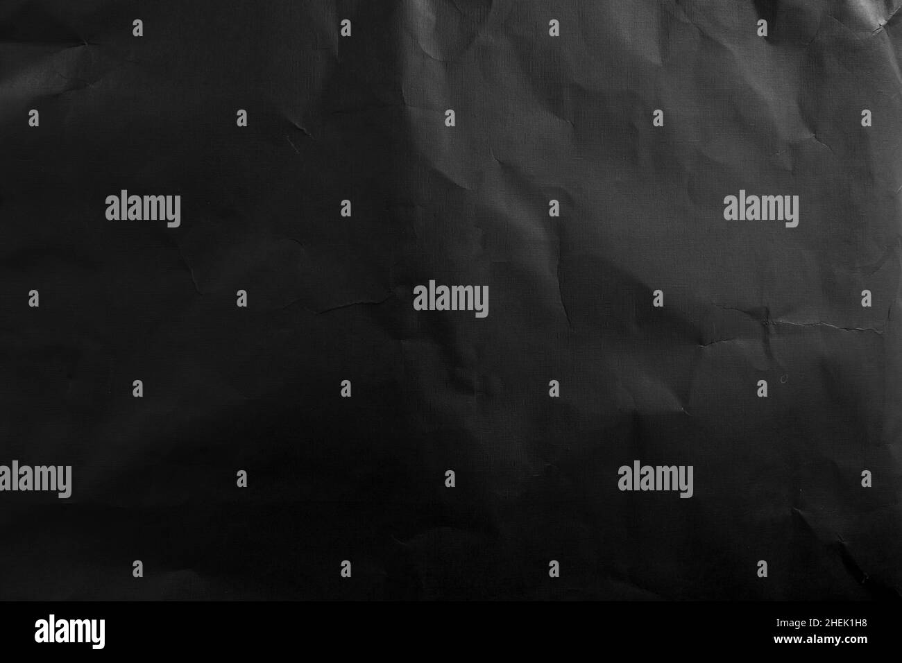 black wrinkled paper texture and background. top view Stock Photo - Alamy
