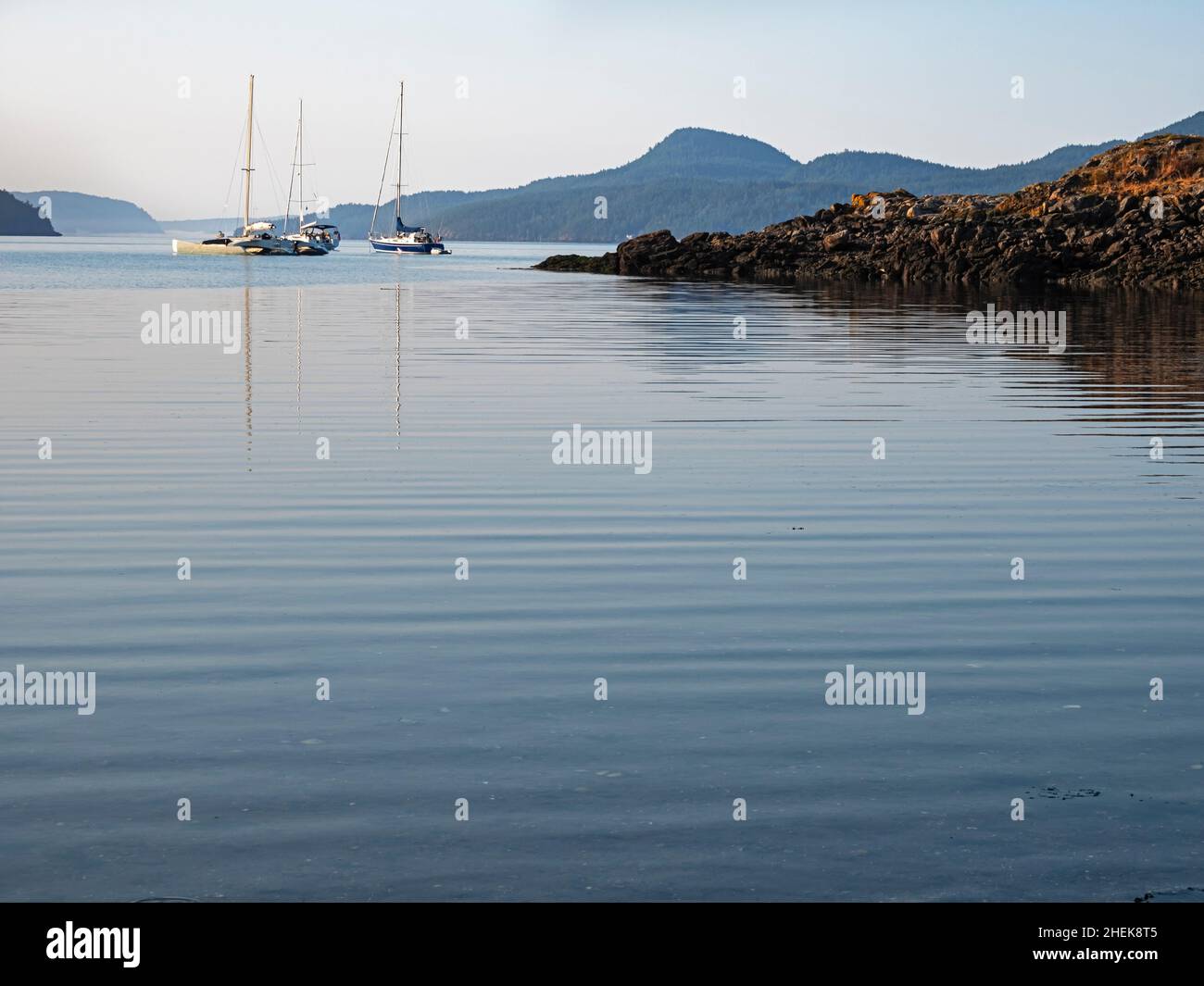 WA21063-00...WASHINGTON - Boats anchored off Eastsound in  Fishing Bay at Orcas Island; one of the San Juan Islands group. Stock Photo