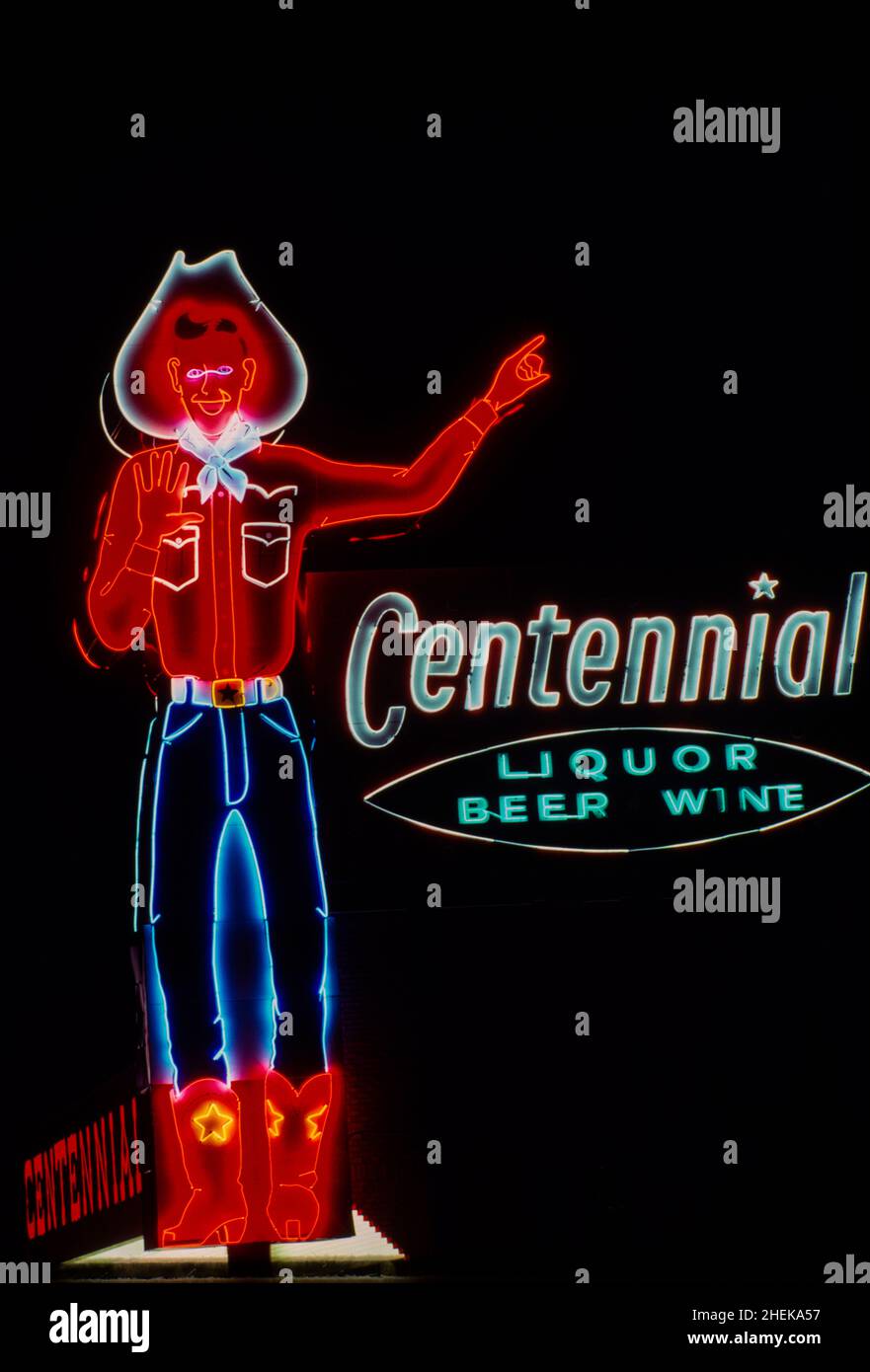Centennial liquor store neon cowboy sign in Las Vegas Nevada Stock