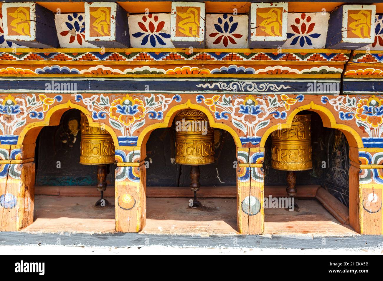 Prayer wheels at  Chimi Lhakhang monastery close to Punakha, Bhutan, Asia Stock Photo