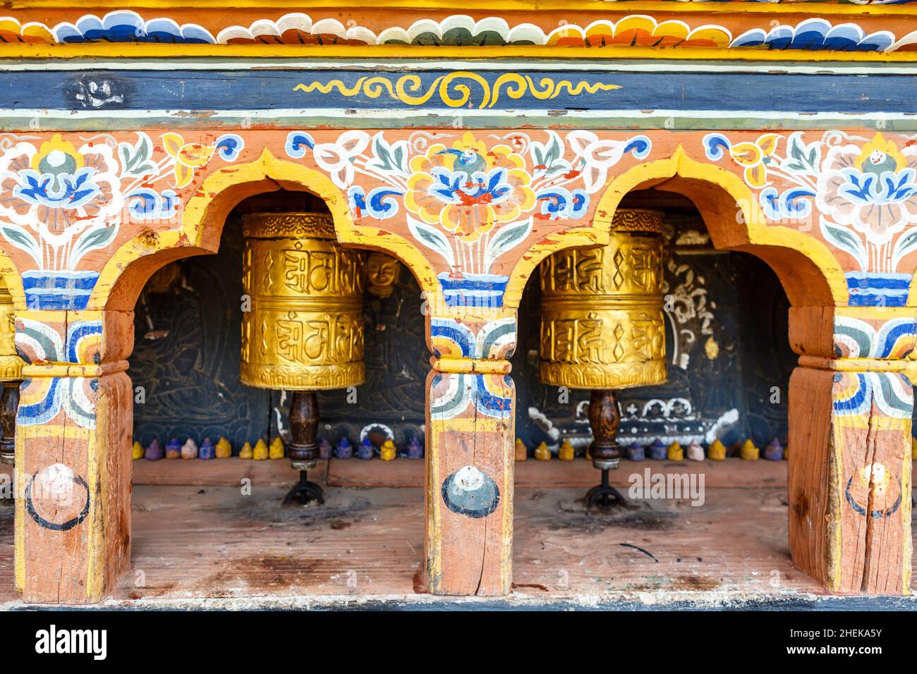 Prayer wheels at  Chimi Lhakhang monastery close to Punakha, Bhutan, Asia Stock Photo