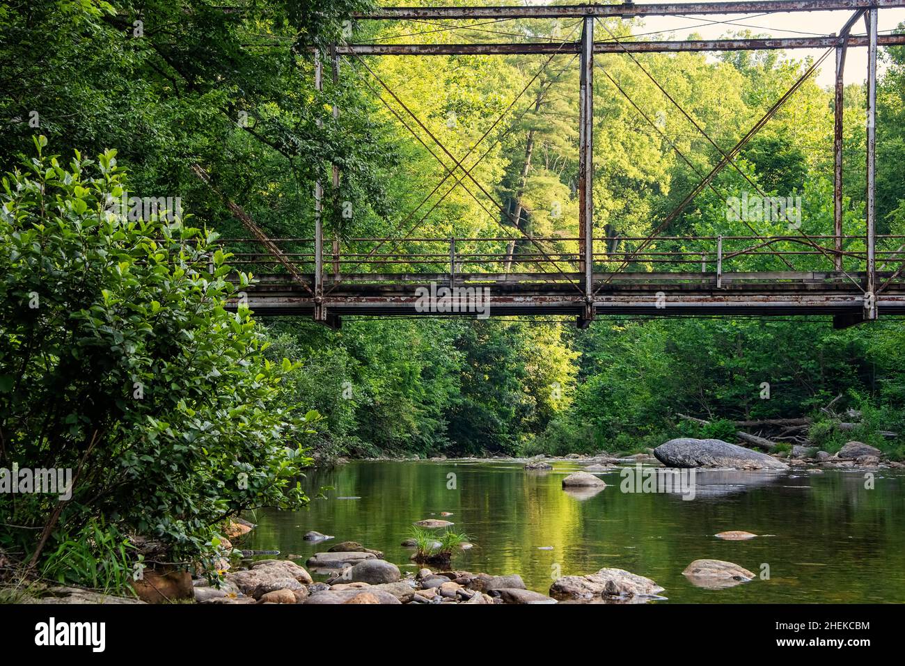 Old bridge across the Pigeon River in western North Carolina Stock Photo