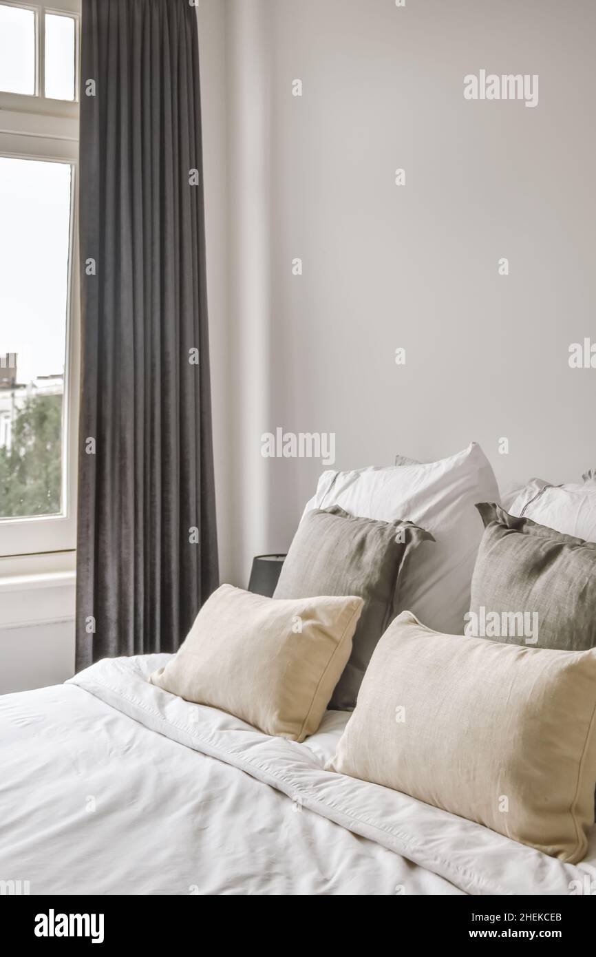 Interior of a cozy and bright bedroom with beautiful decoration Stock ...