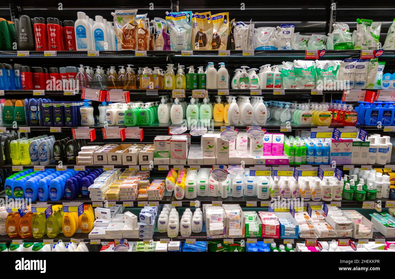 Fossano, Italy - November 25, 2021: hand soap, neutral detergents, intimate cleanser, bubble bath displayed on italian supermarket shelf in the body c Stock Photo