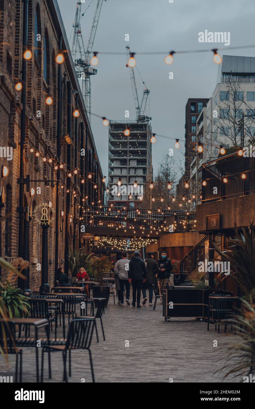 London, UK January 01, 2022 People walking under the lights in Coal