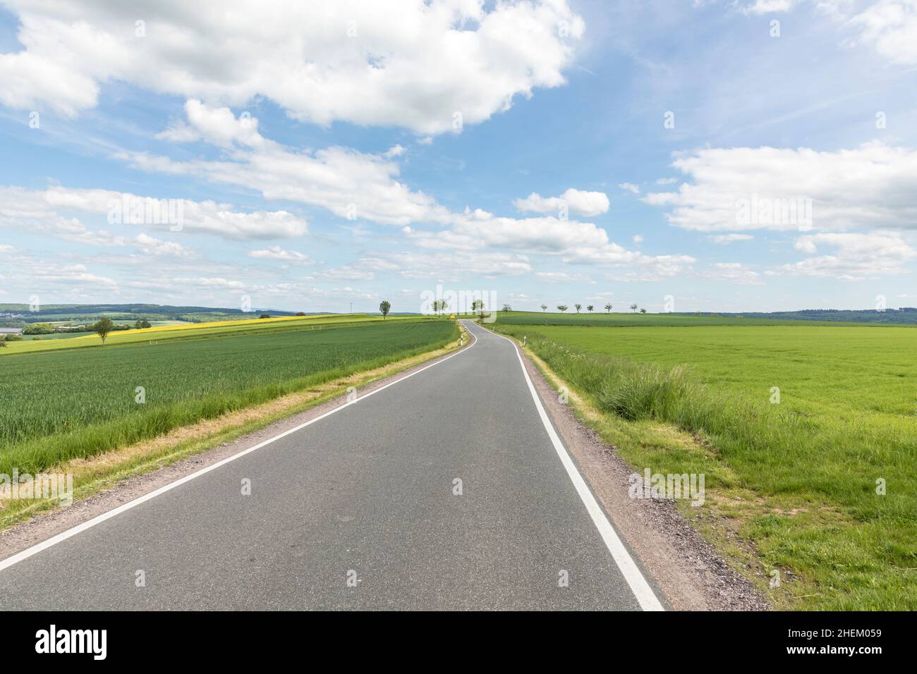 green and yellow fields with no people in Germany Stock Photo