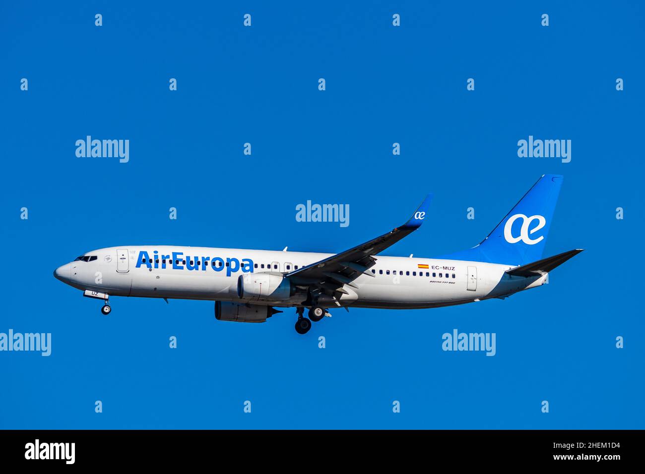 Madrid, Spain - December 31, 2021: Boeing 737-800 passenger aircraft of the airline Air Europa flying before landing against the clear blue sky. Stock Photo