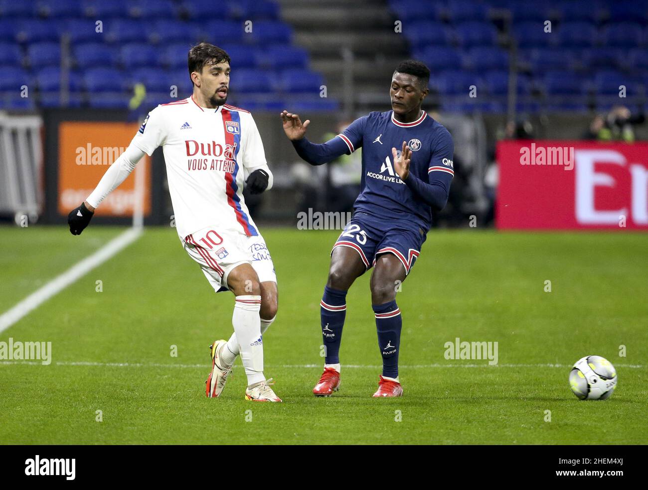 Lucas Paqueta of Lyon, Nuno Mendes of PSG during the French championship Ligue 1 football match between Olympique Lyonnais (Lyon) and Paris Saint-Germain on January 9, 2022 at Groupama stadium in Decines-Charpieu near Lyon, France - Photo: Jean Catuffe/DPPI/LiveMedia Stock Photo