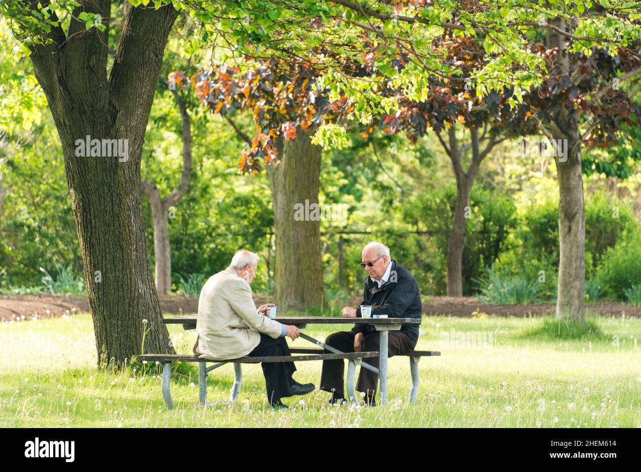 Two old men sitting in hi-res stock photography and images - Alamy
