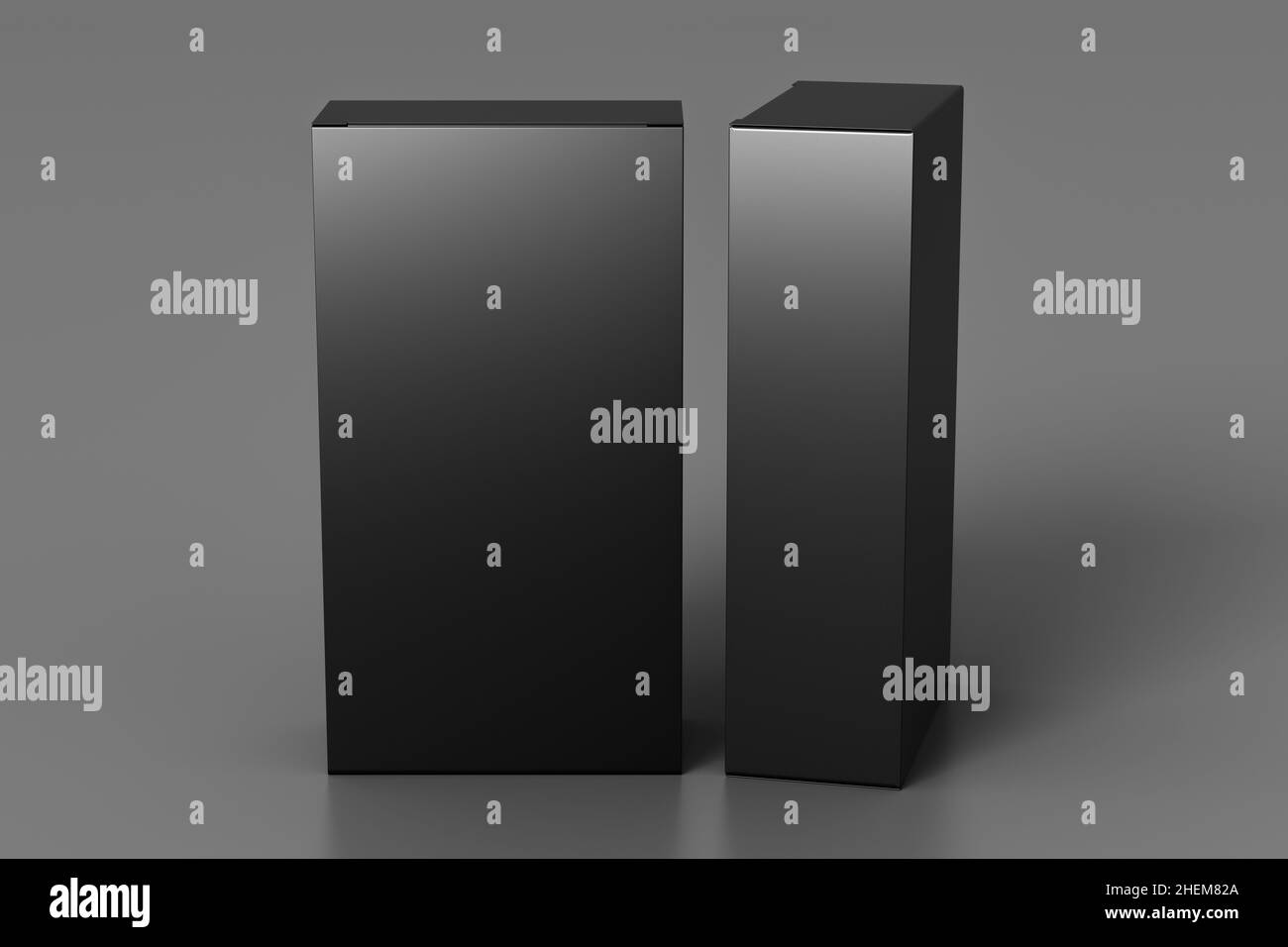 Gift box mock up: two tall and wide black boxes on gray background. View above Stock Photo