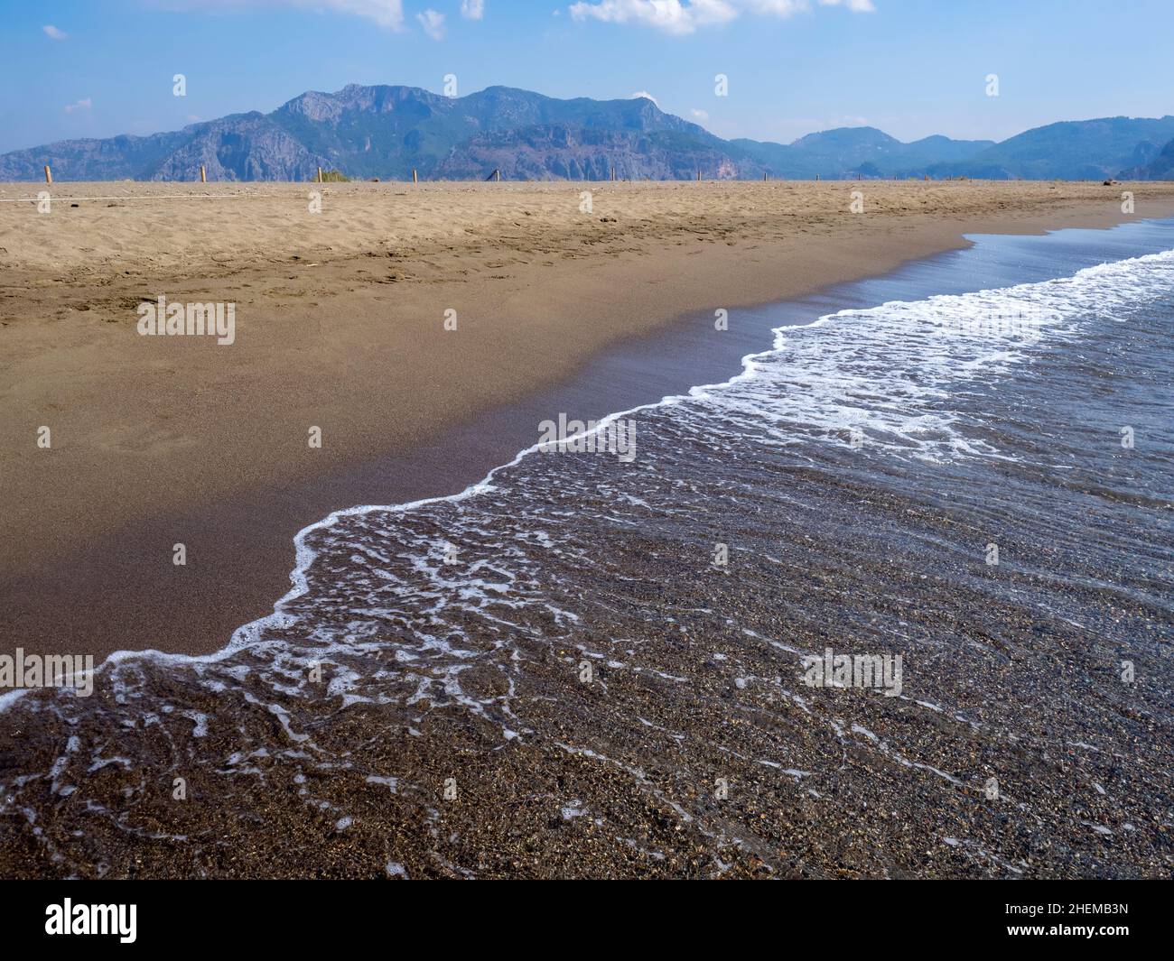 Wave of the sea on the sand beach with sunlight , for background Stock ...