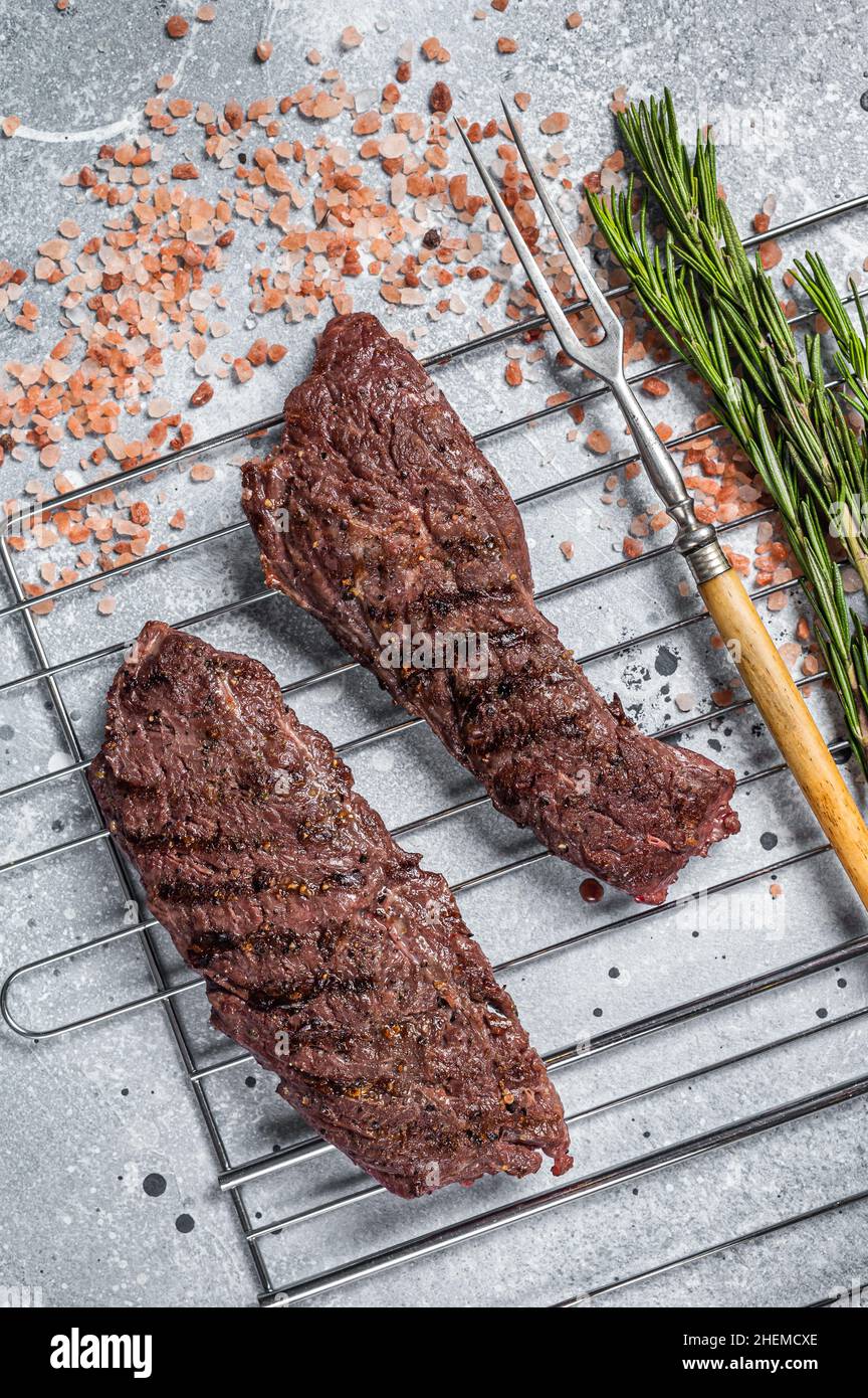 Grilled Flap steak flank cut and Machete skirt steak on grill with