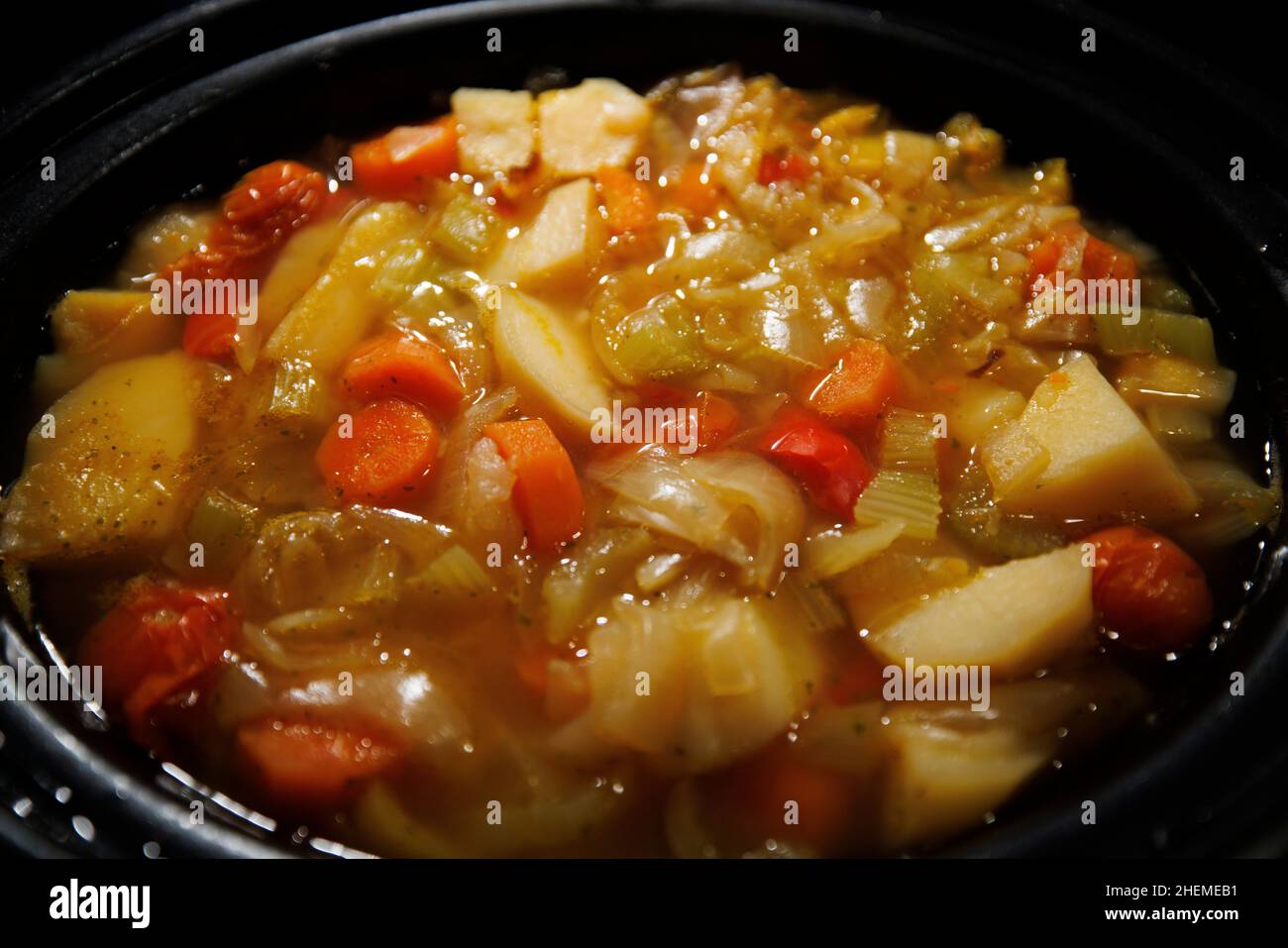 Vegetables in a slow cooker Stock Photo - Alamy