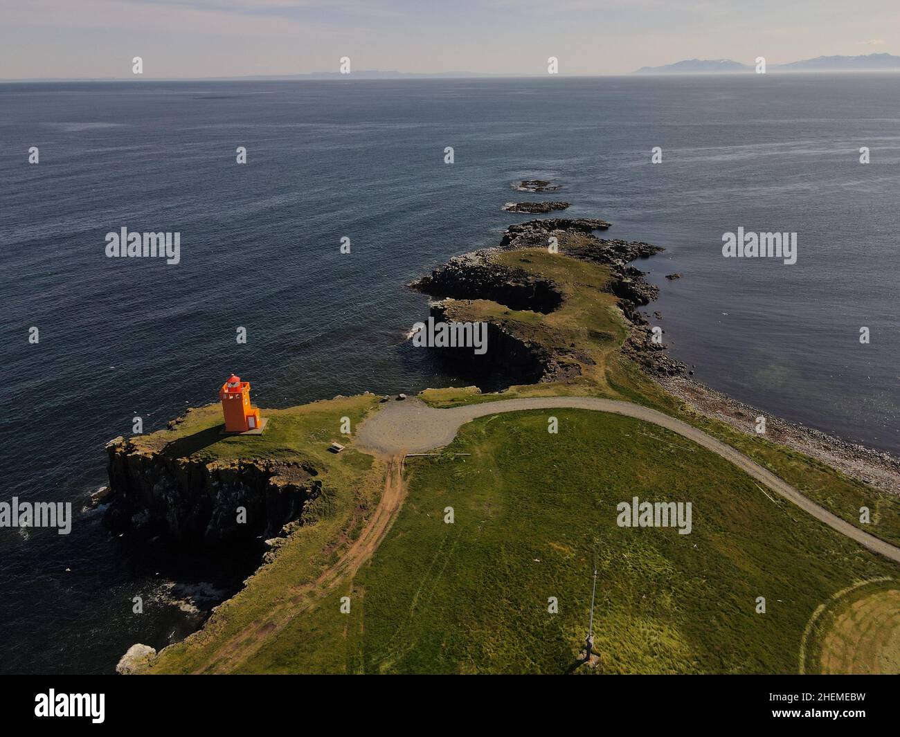 Aerial drone landscape of cliffs and lighthouse of Grimsey Island in