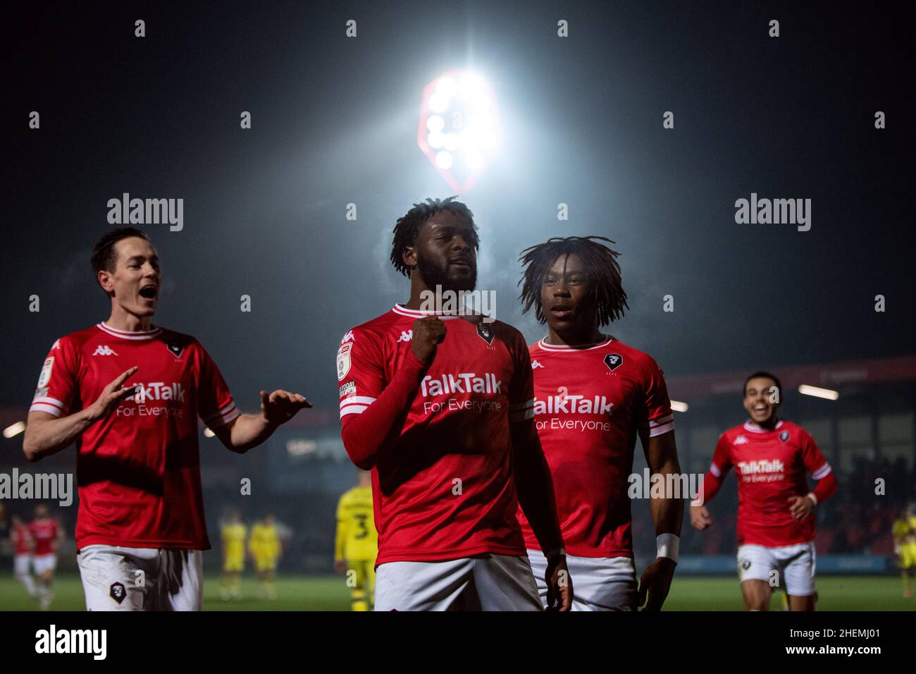 Salford, UK. 11th Jan 2022. Aramide Oteh scores the opening goal for Salford, after an error from Tranmere goalkeeper Joel Torrence, as the hosts lead 1-0 at half time. Stock Photo