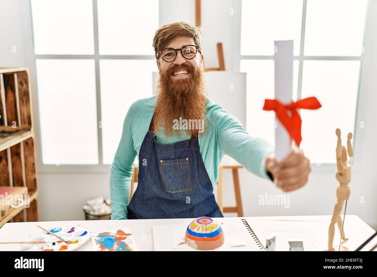 Smiling redhead man painting hi-res stock photography and images - Alamy