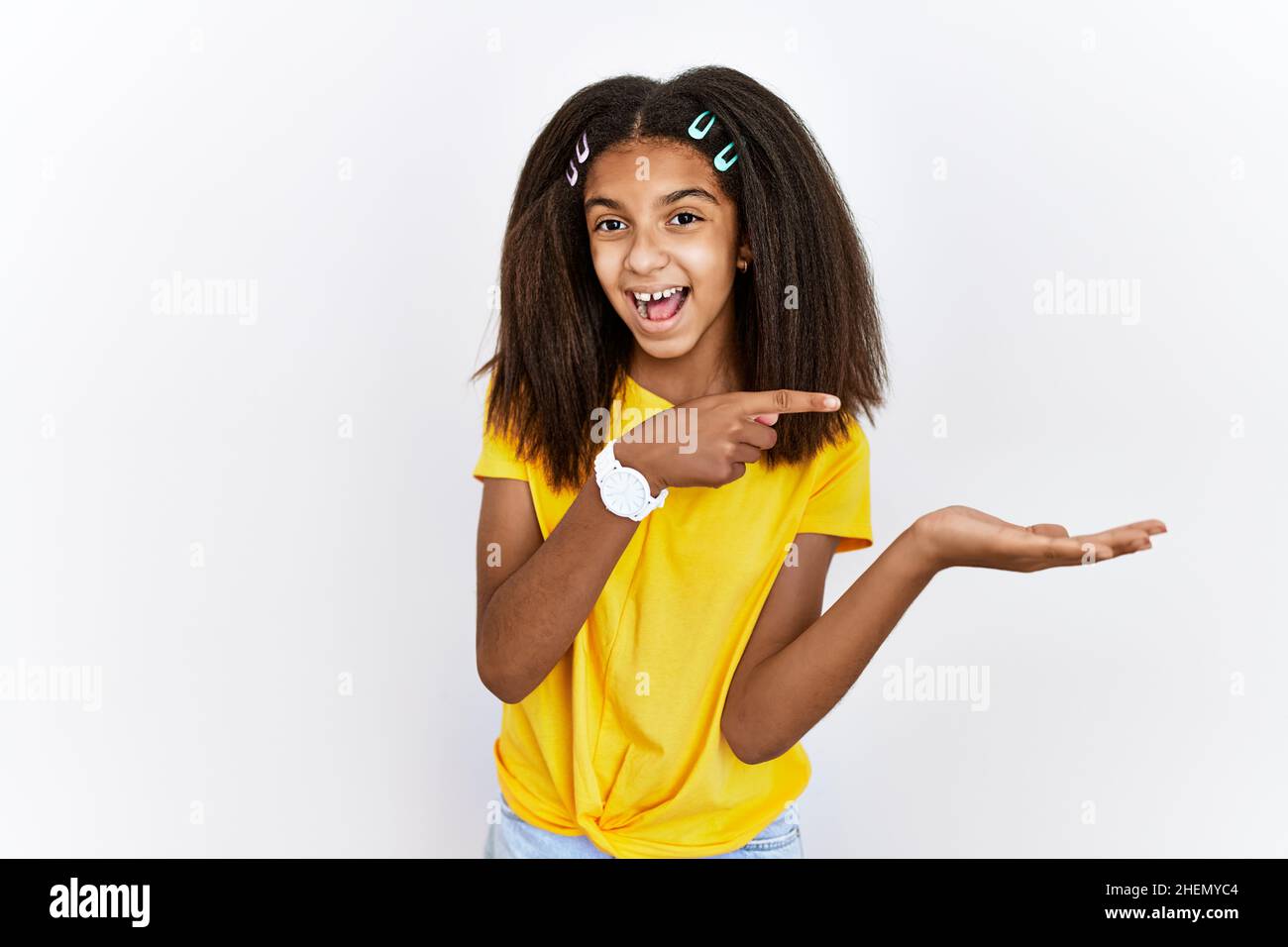 young-african-american-girl-standing-over-white-isolated-background