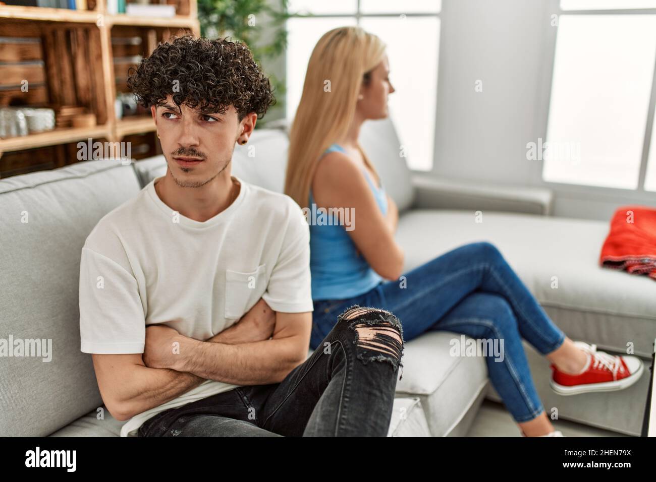 Young couple angry sitting on the sofa in silence at home Stock Photo ...
