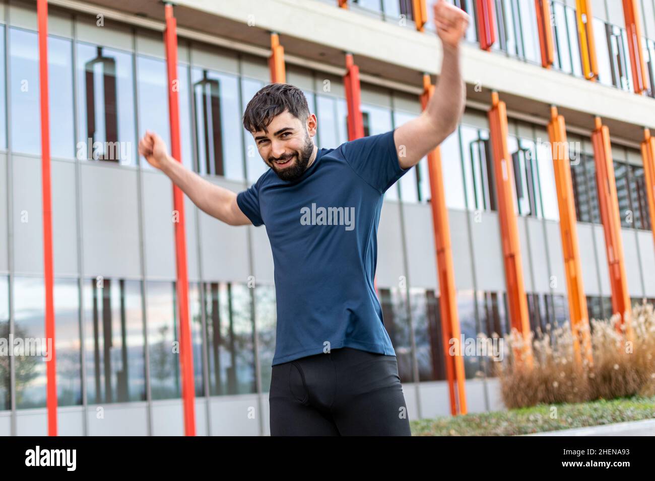 Young man doing their stretches Stock Photo