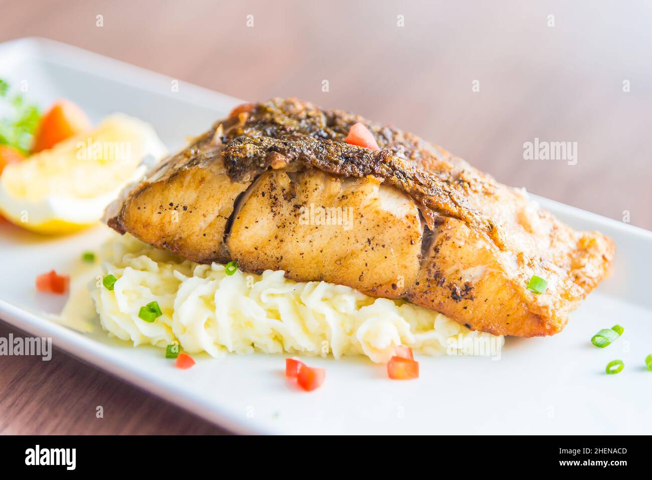 Sea bass grilled steak Stock Photo Alamy