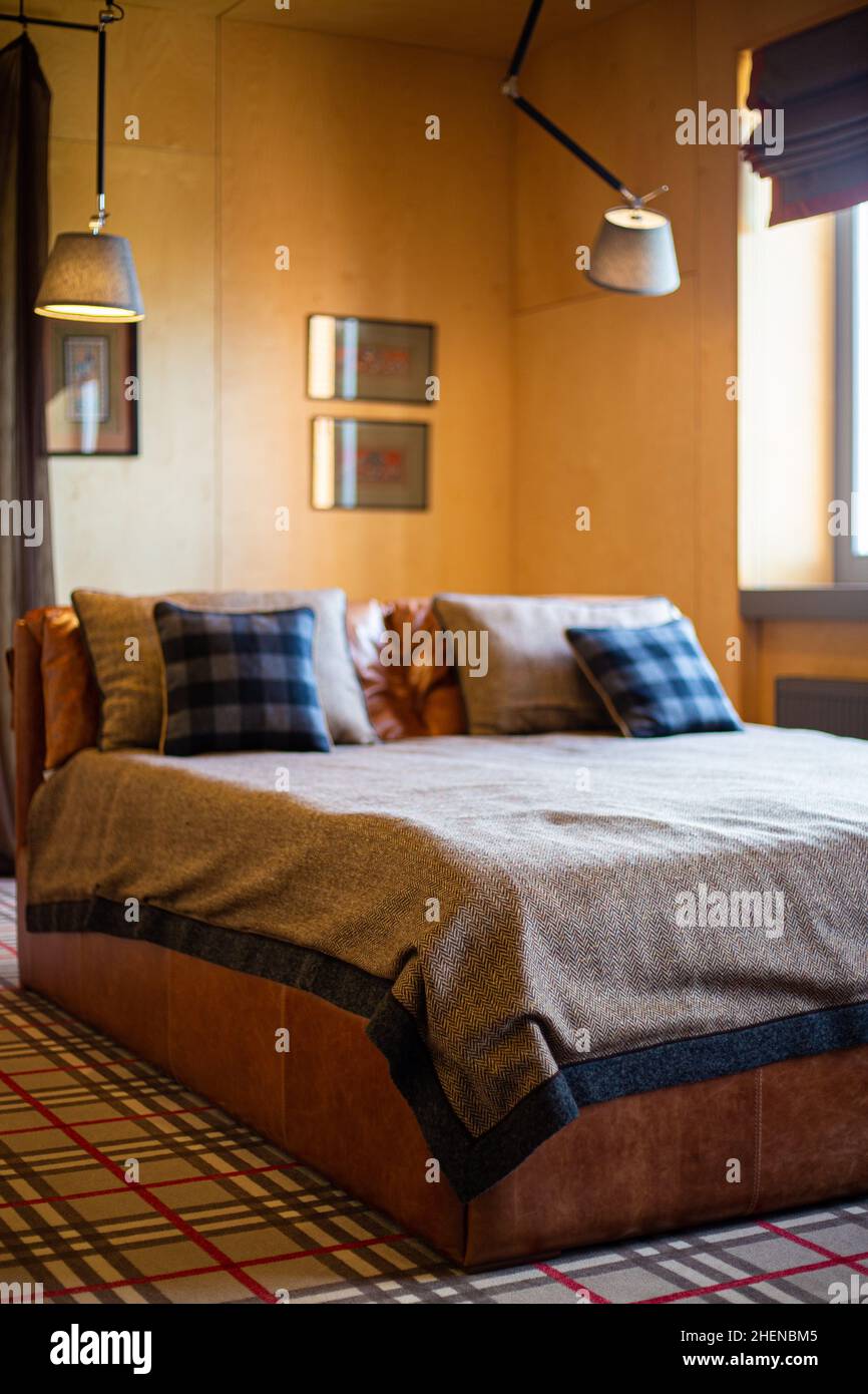 King-size bed in a modern bedroom Stock Photo