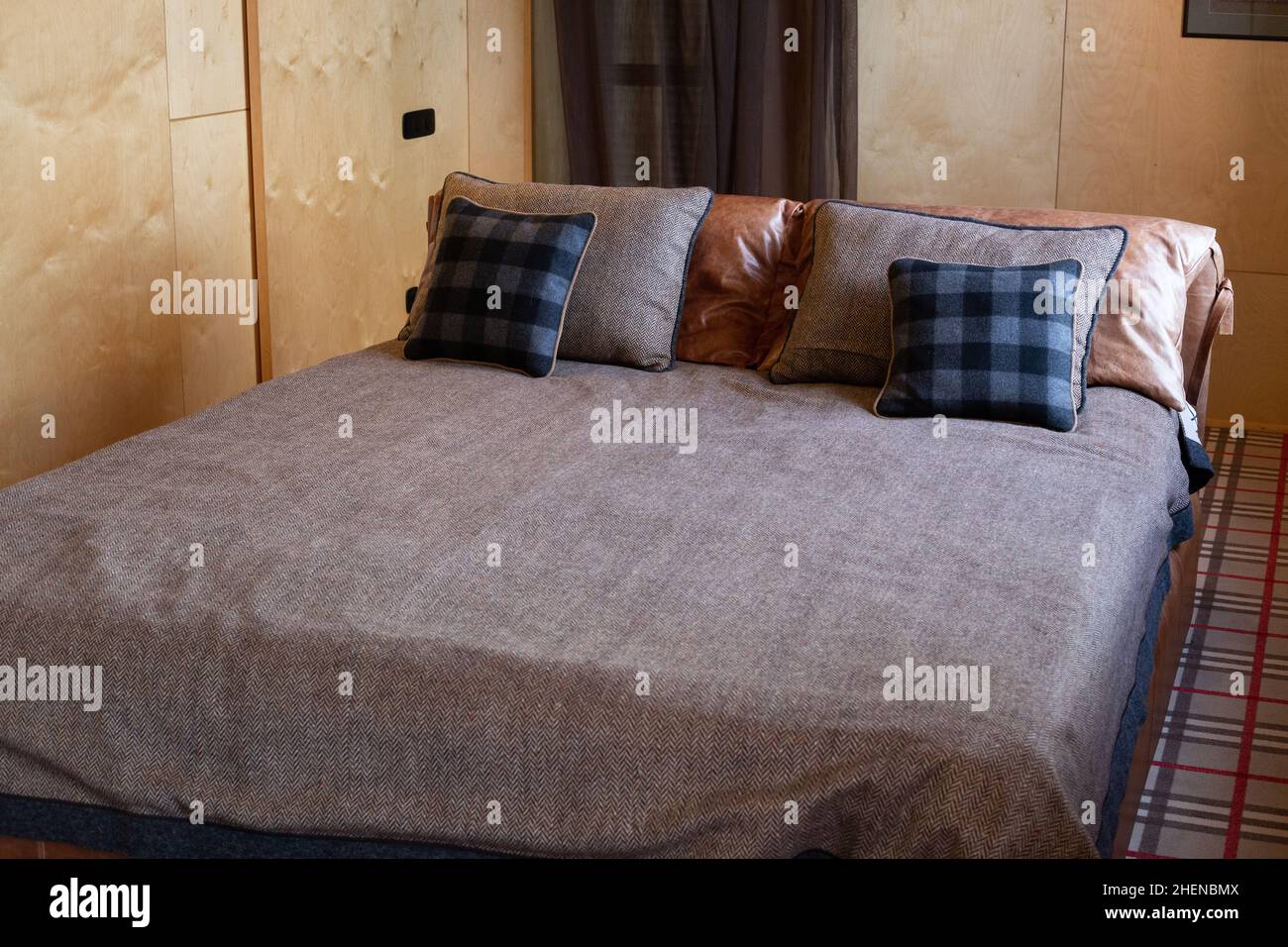 King-size bed in a modern bedroom Stock Photo