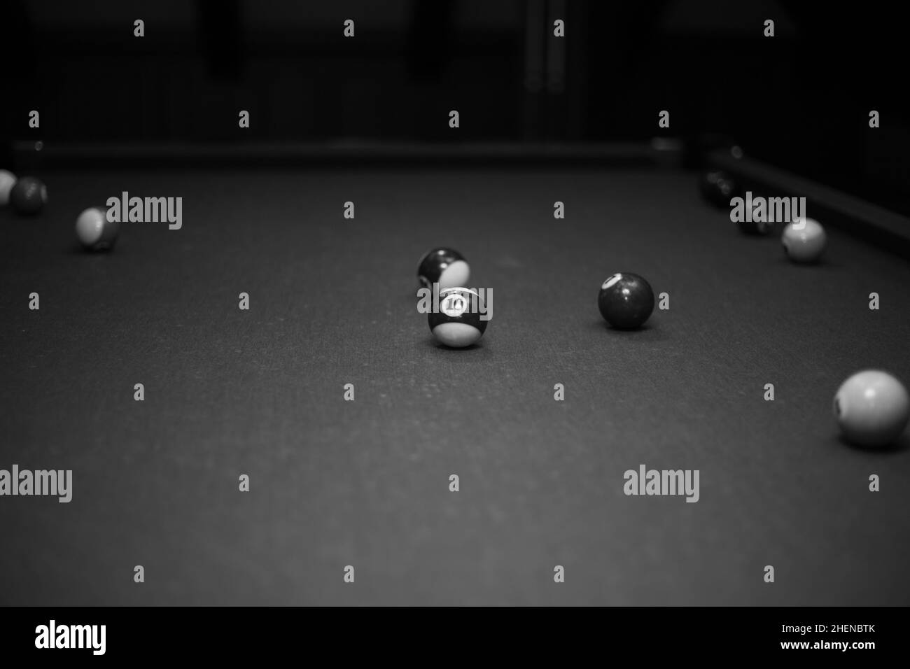 Billiard table in the billiard room with balls and cue Stock Photo Alamy