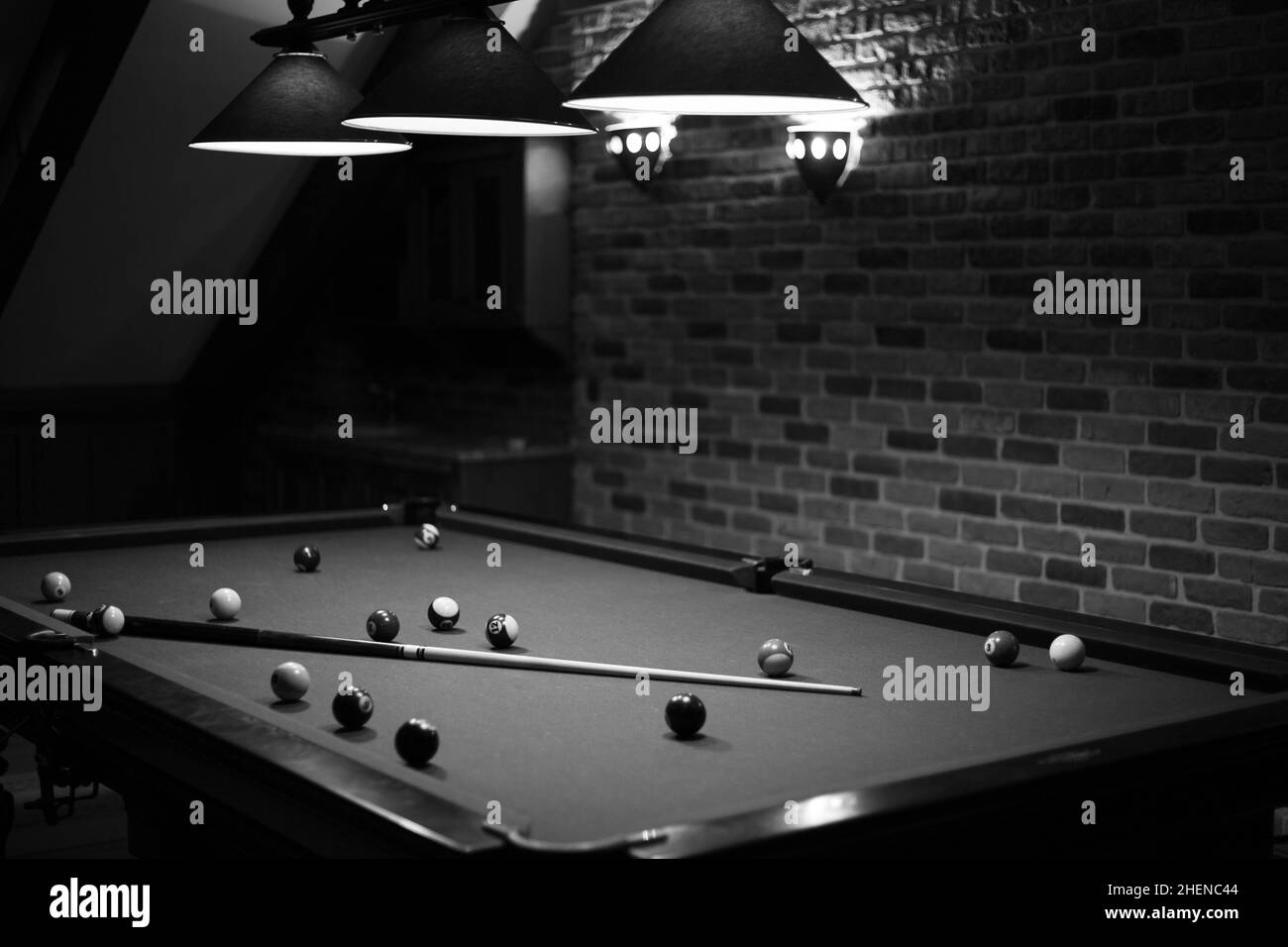 Billiard table in the billiard room with balls and cue Stock Photo Alamy