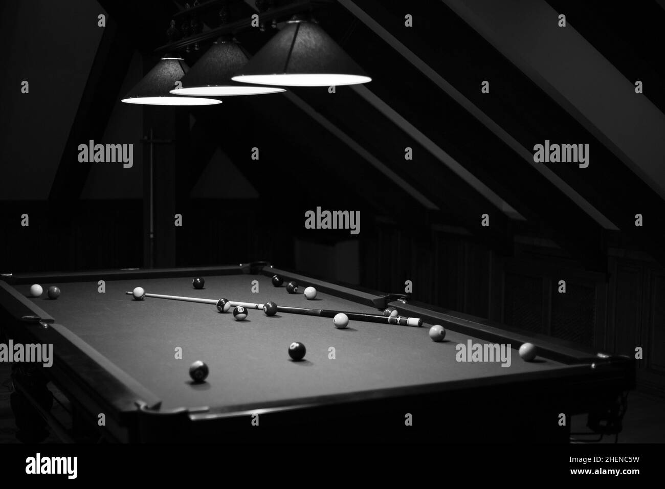 Billiard table in the billiard room with balls and cue Stock Photo Alamy