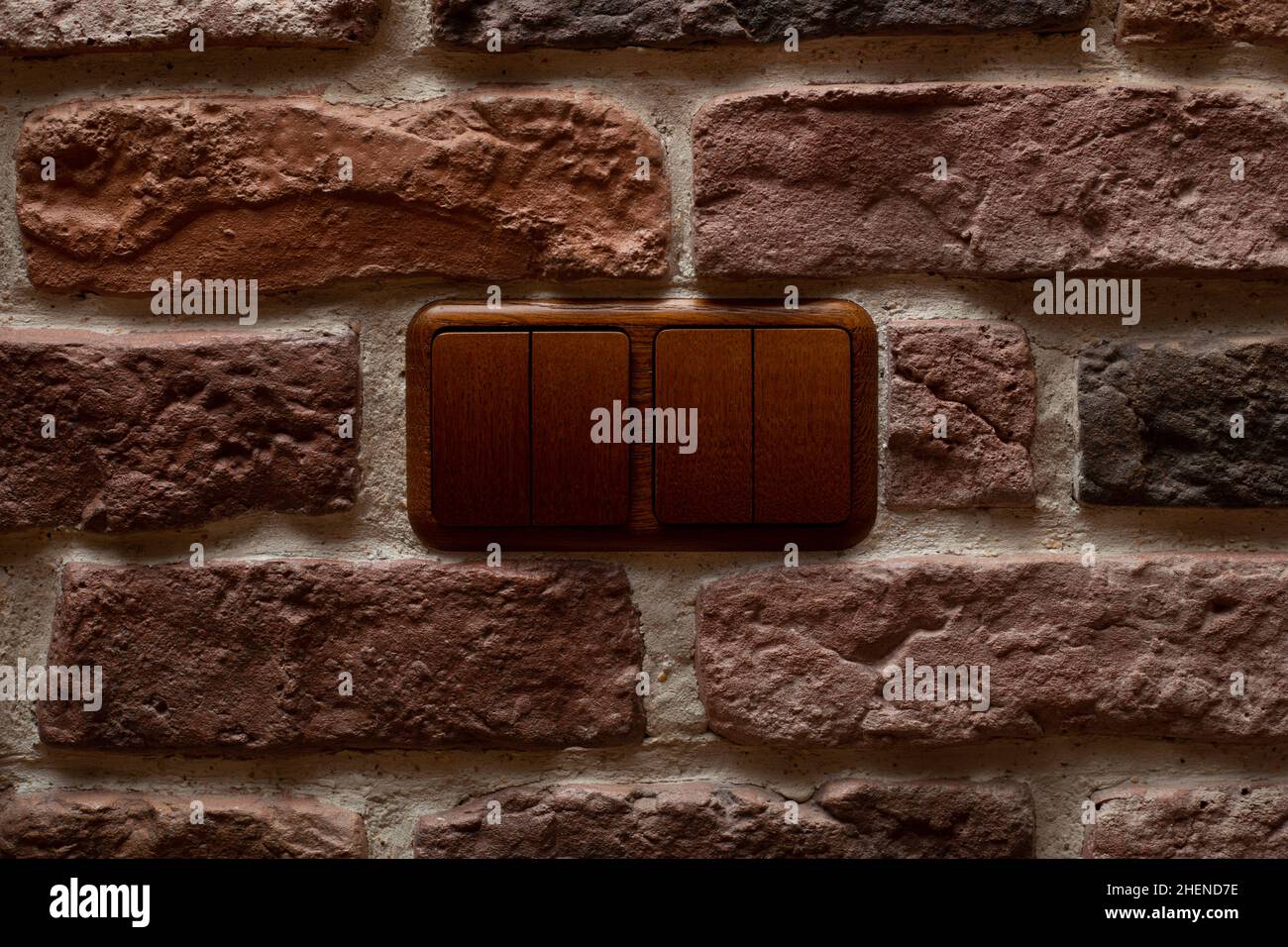 Switch for light on the wall inside the house Stock Photo