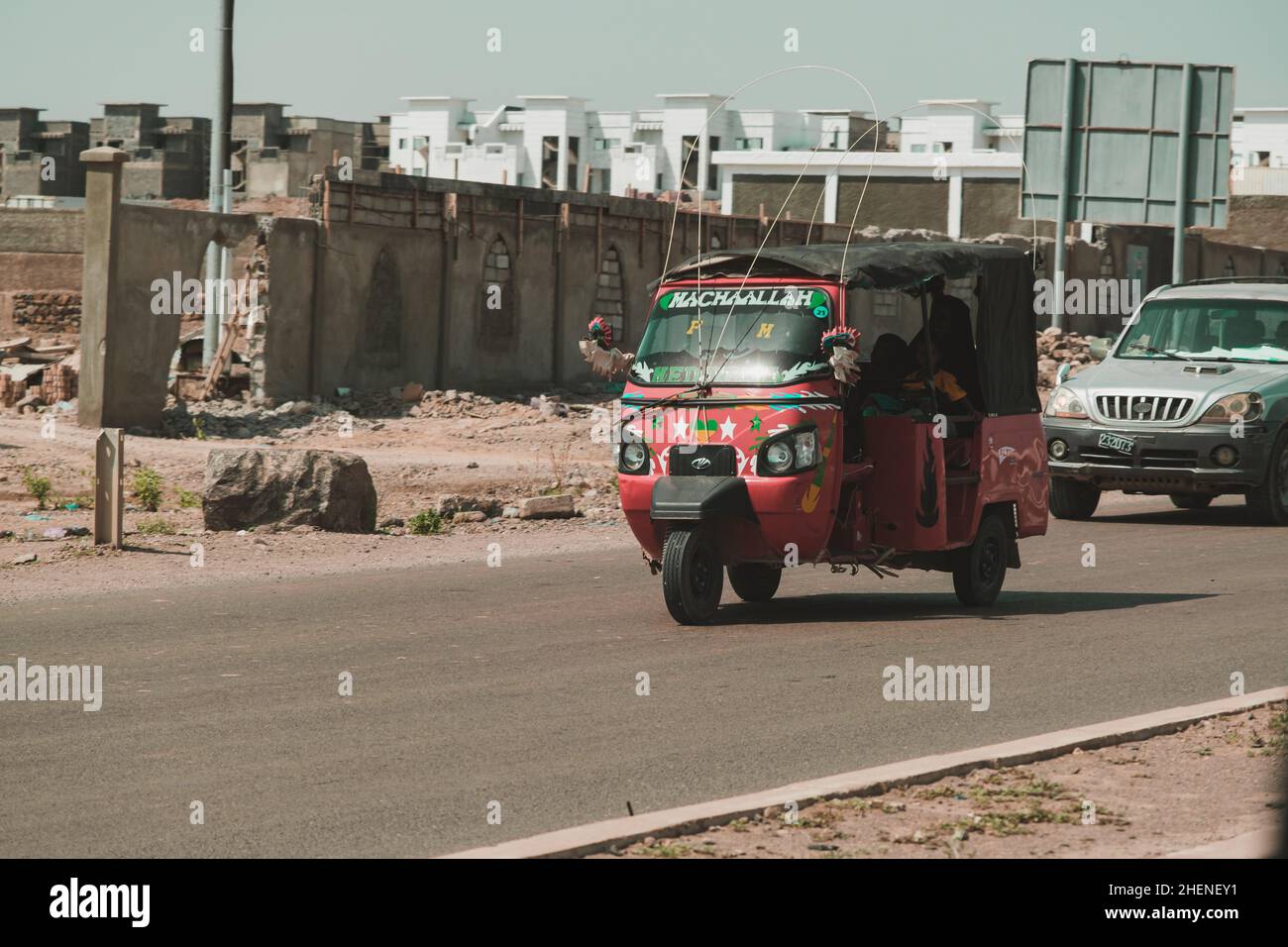 Djibouti, Djibouti - May 21, 2021: Auto rickshaw local taxi on the road in Djibouti. Editorial shot in Djibouti. Stock Photo