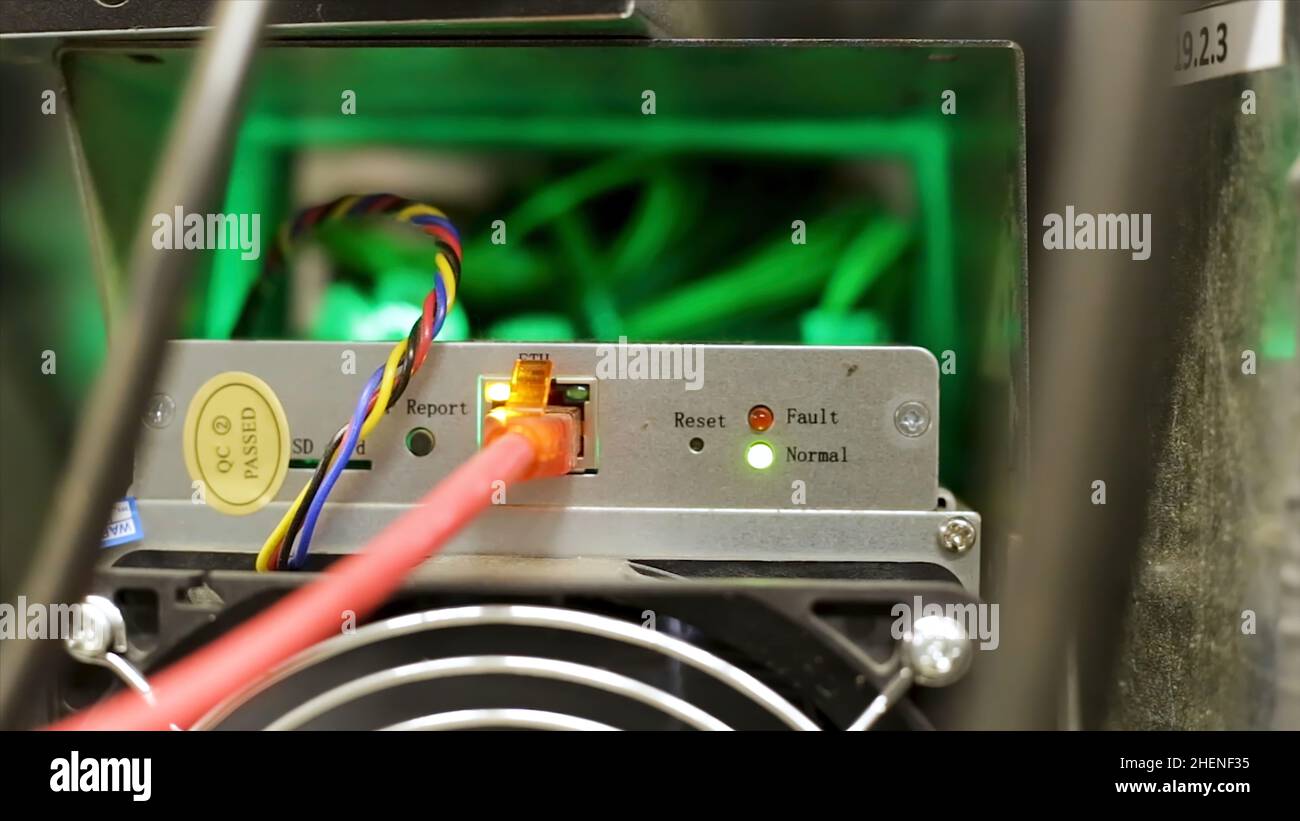 Rear view of an antminer device, bitcoin mining hardware. Close up of  professional equipment for digital currency mining Stock Photo - Alamy