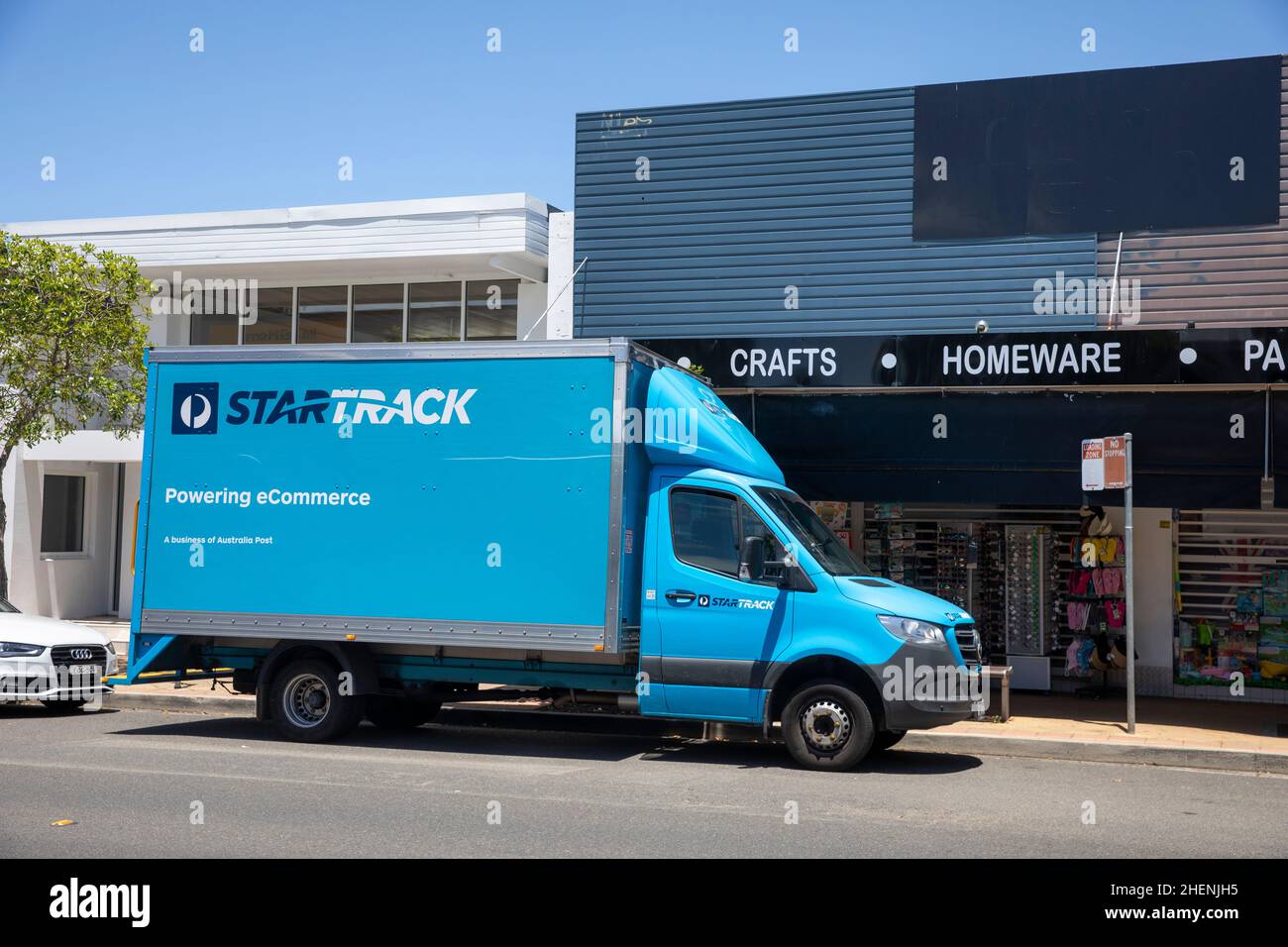 Startrack parcel delivery van parked in Avalon Beach,Sydney, StarTrack is owned by Australia Post and manages parcel delivery and logistics Stock Photo