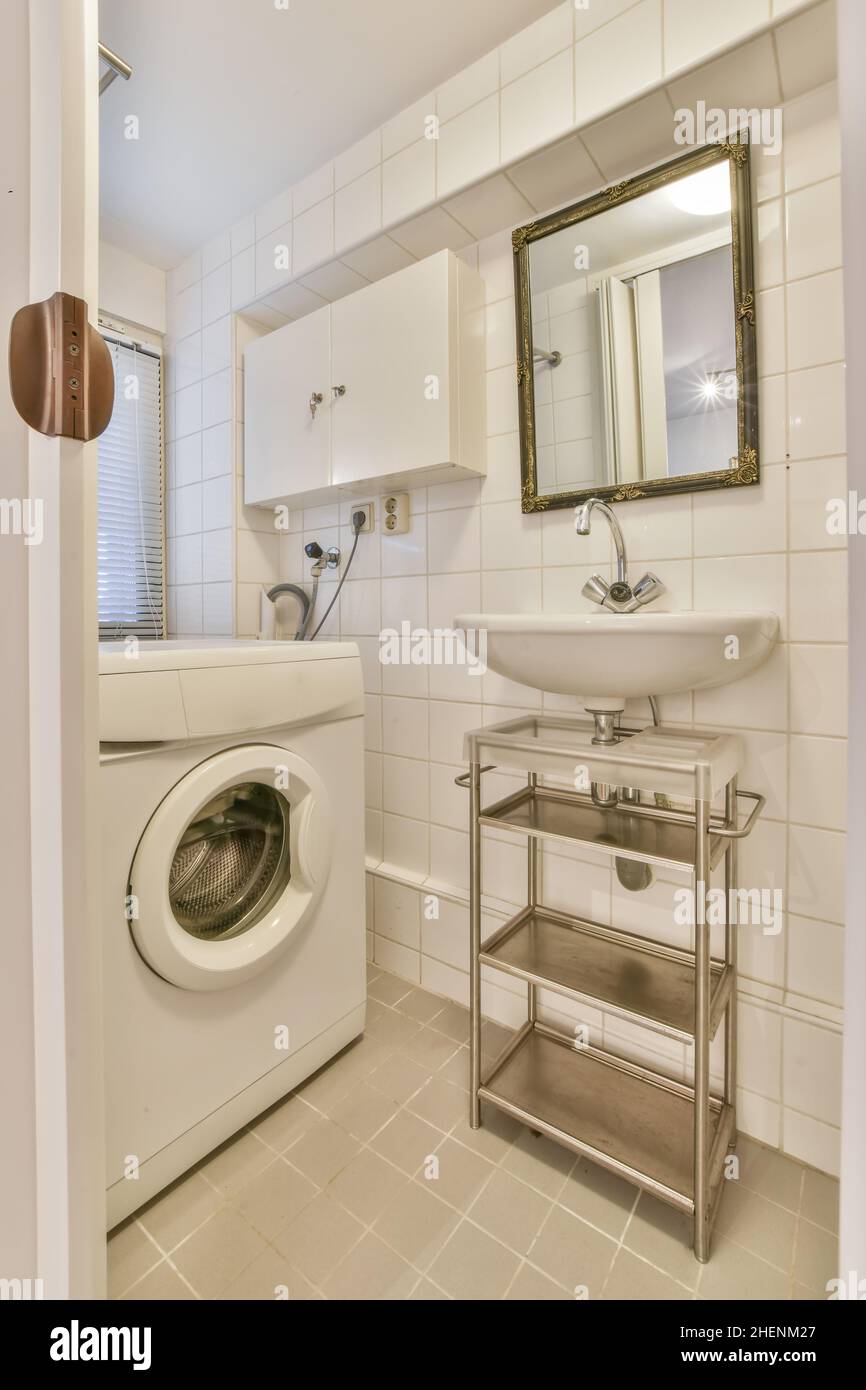 Laundry interior design in a luxury house Stock Photo - Alamy