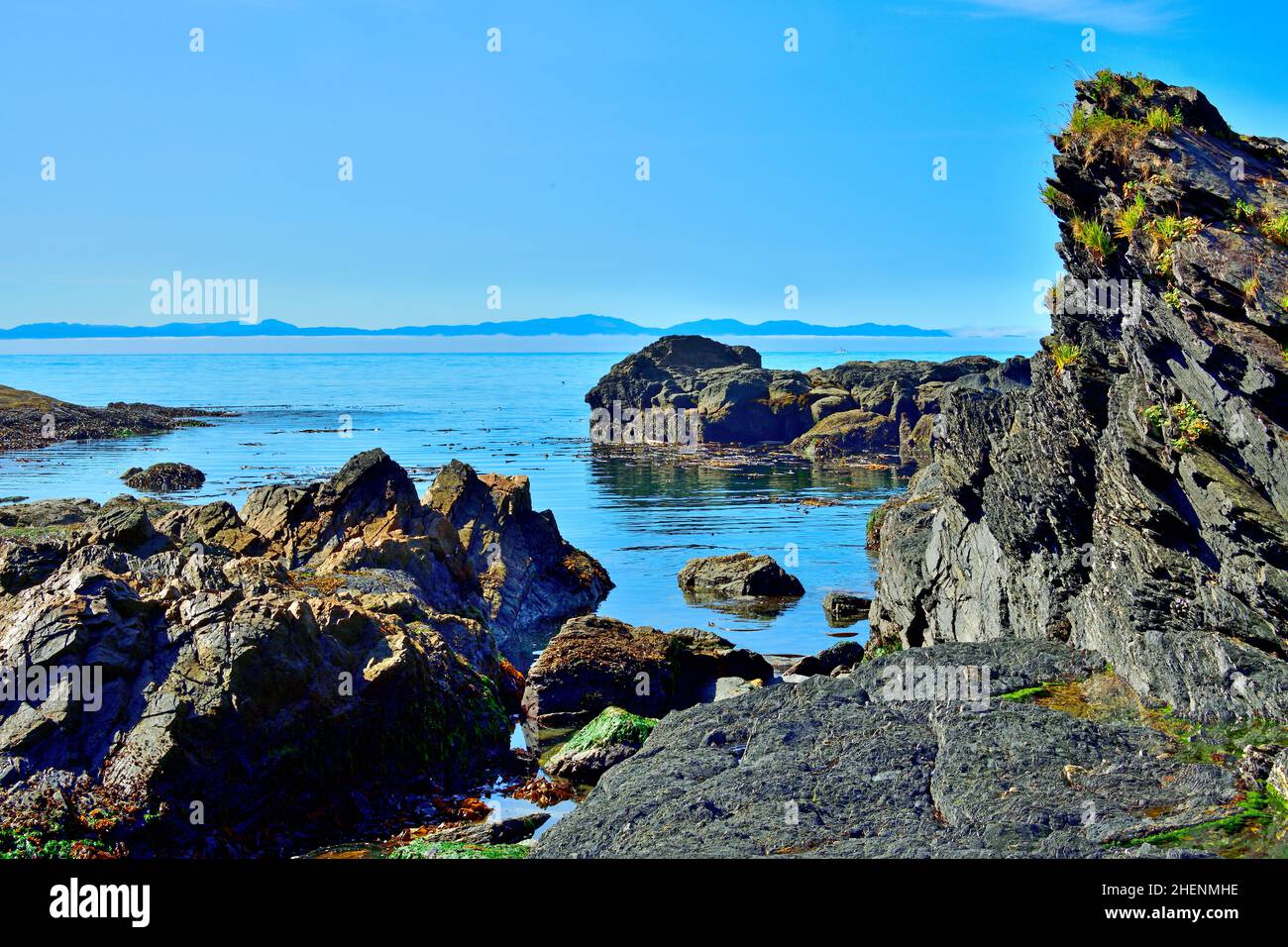 A landscape image of the rugged west coast of Vancouver Island looking toward the Pacific Ocean. Stock Photo