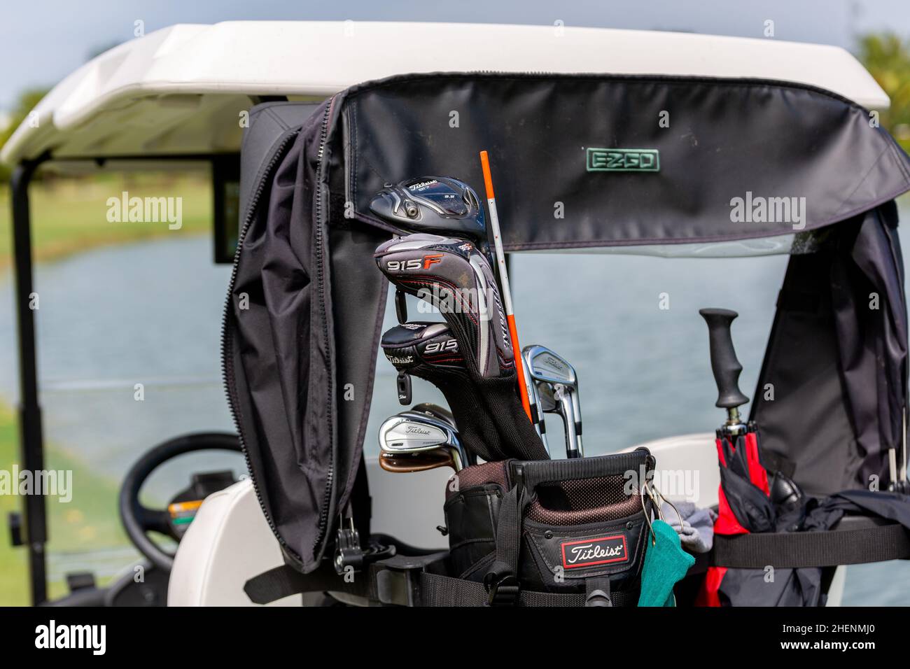 Golf player teeing off. Man hitting golf ball from tee box at Golf Club