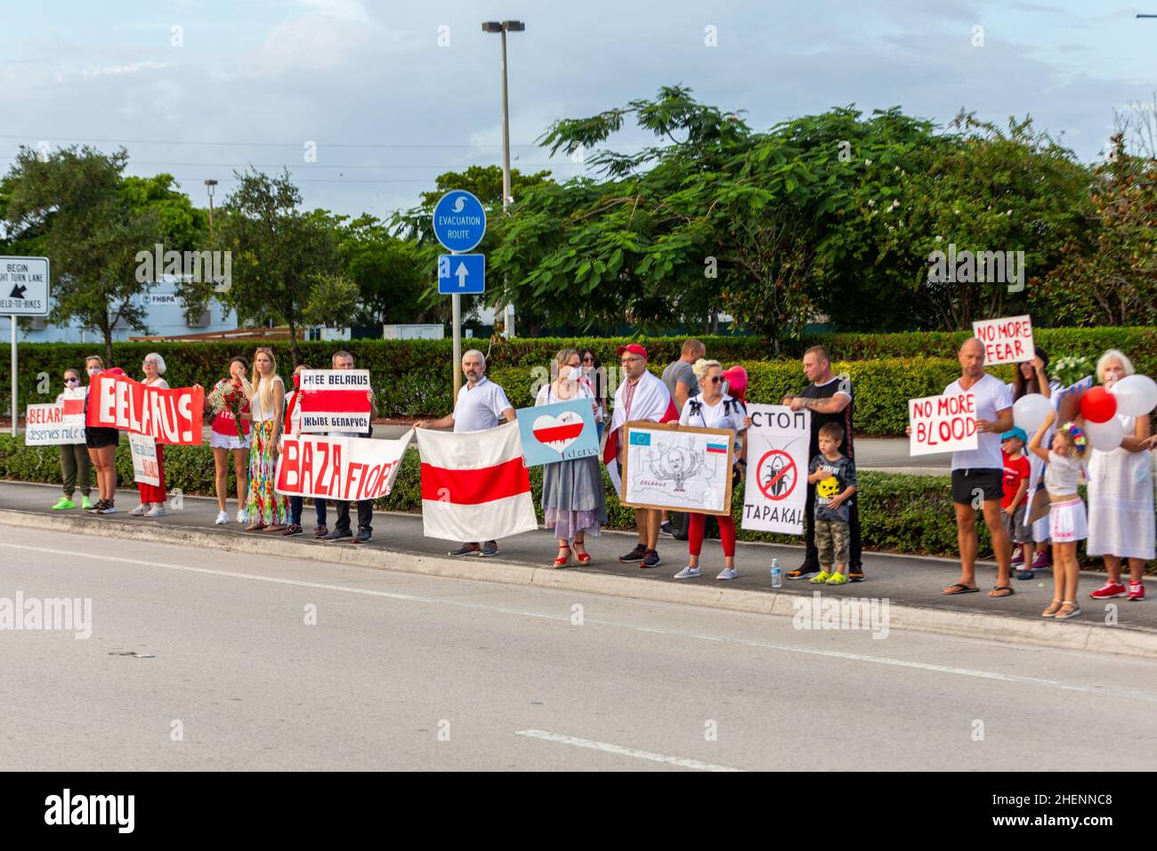 Belarus people at a protest against Lukashenko in Florida, USA. Signs for a fair election, freedom of political prisoners at Belarus. Protesters. Stock Photo