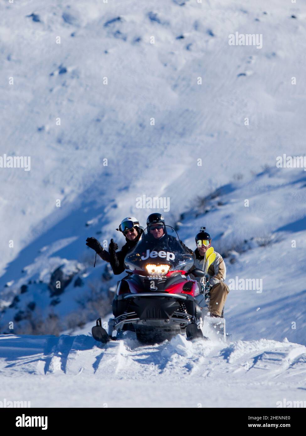 Snowmobile riding over the back of Mount Mackay in the Fall's Creek Ski Resort back country. Stock Photo