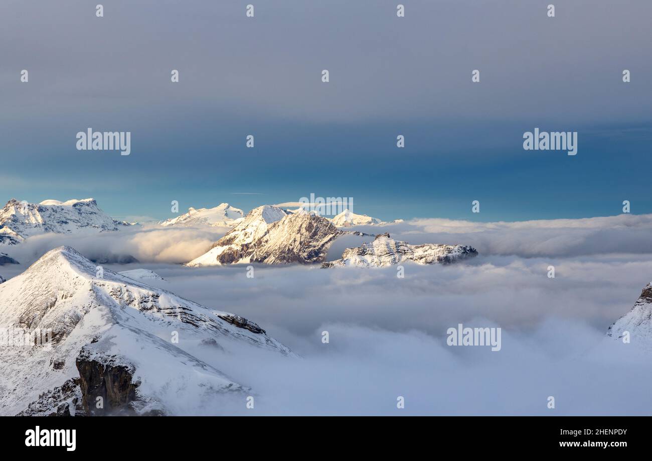Swiss Alps above the clouds. Stock Photo